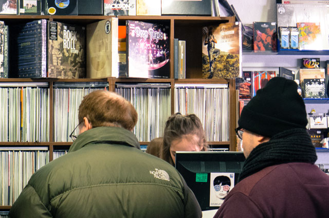 Two customers waiting at the till in David's Music Letchworth on Record Store Day 2015
